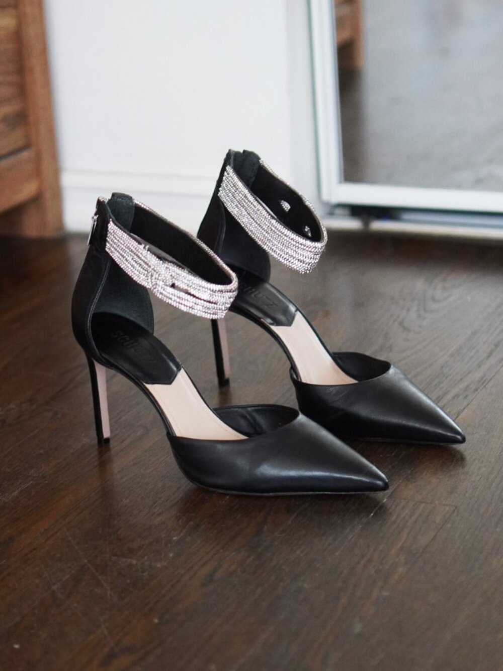 SCHUTZ EMBELLISHED ANKLE STRAP POINTY TOE HEELS IN BLACK